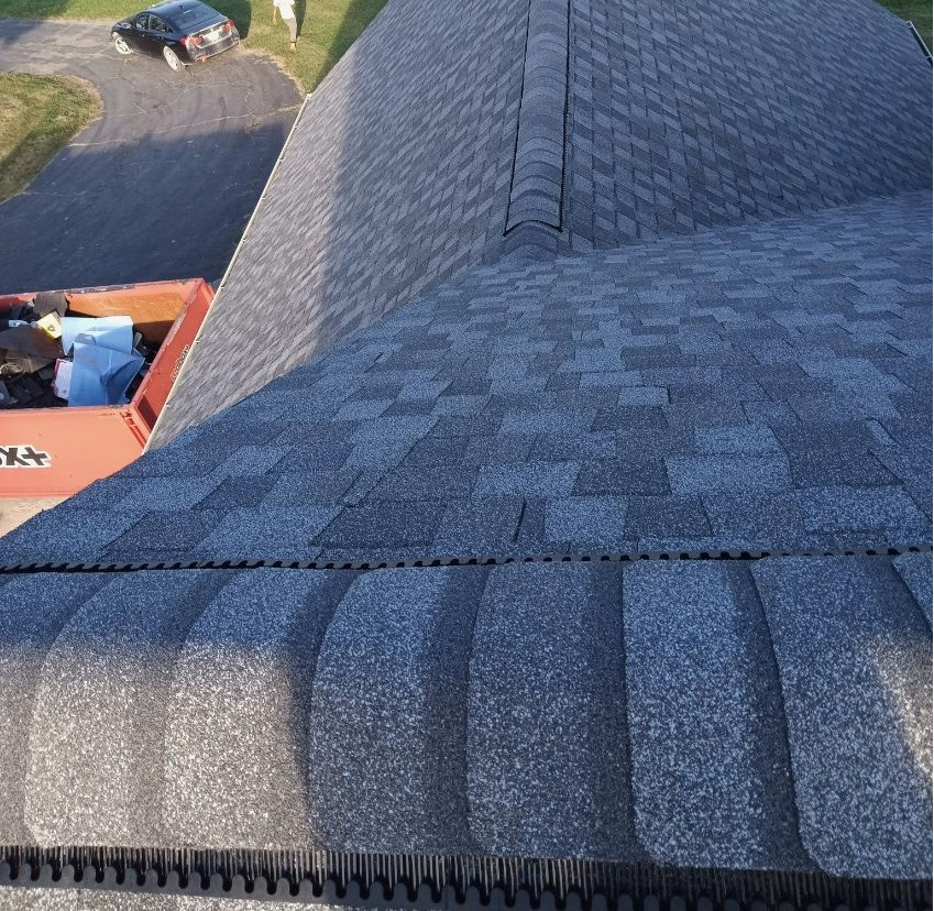 Completed charcoal shingle roof corner detail Michigan